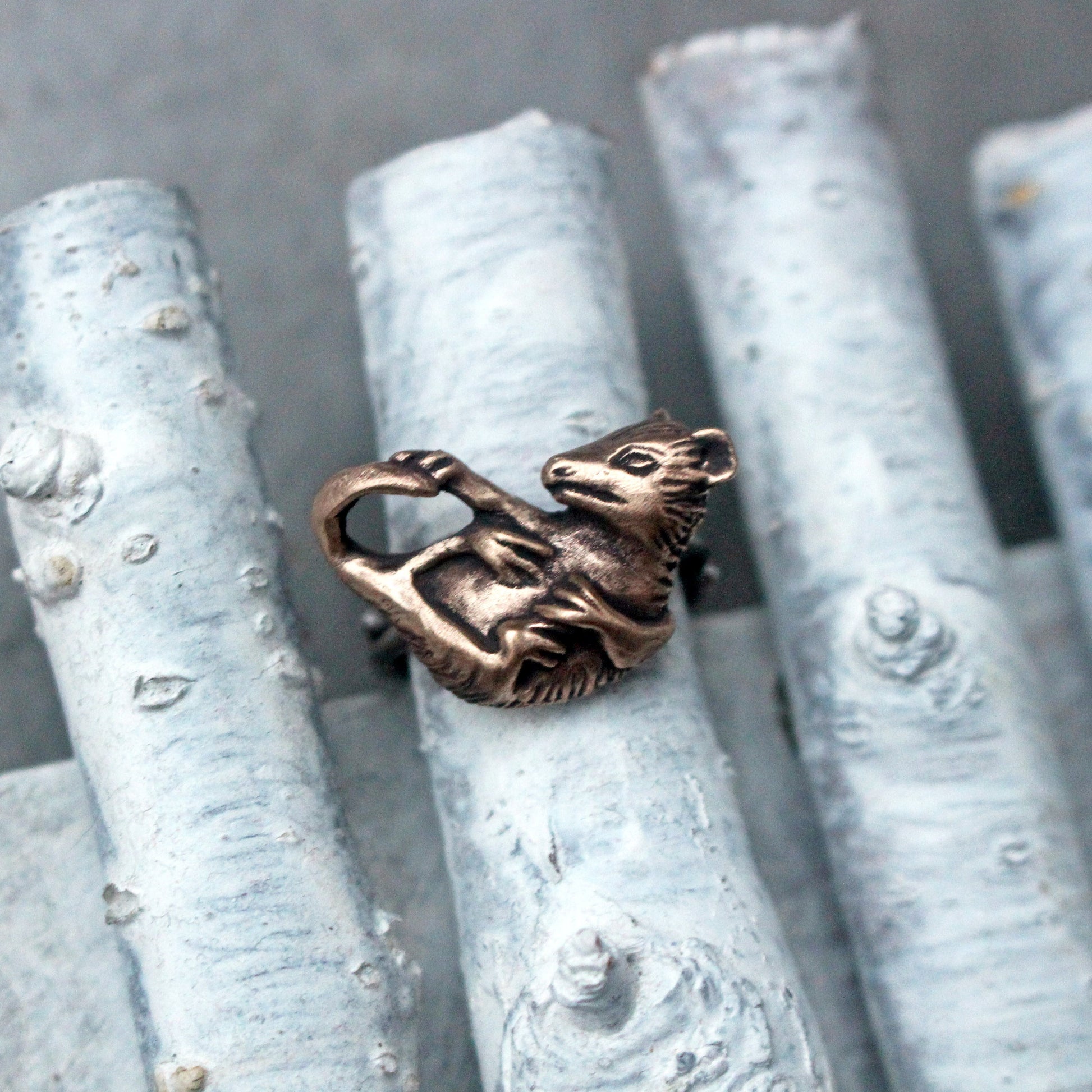 justerbar opossum ring i brons  o stål