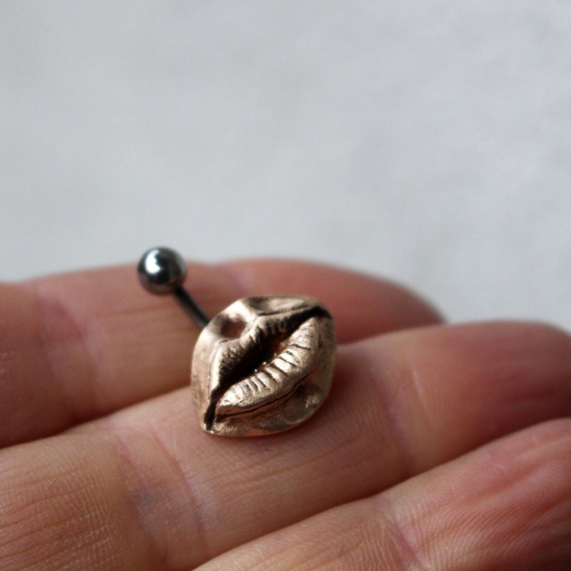 pussmun navel piercing smycke