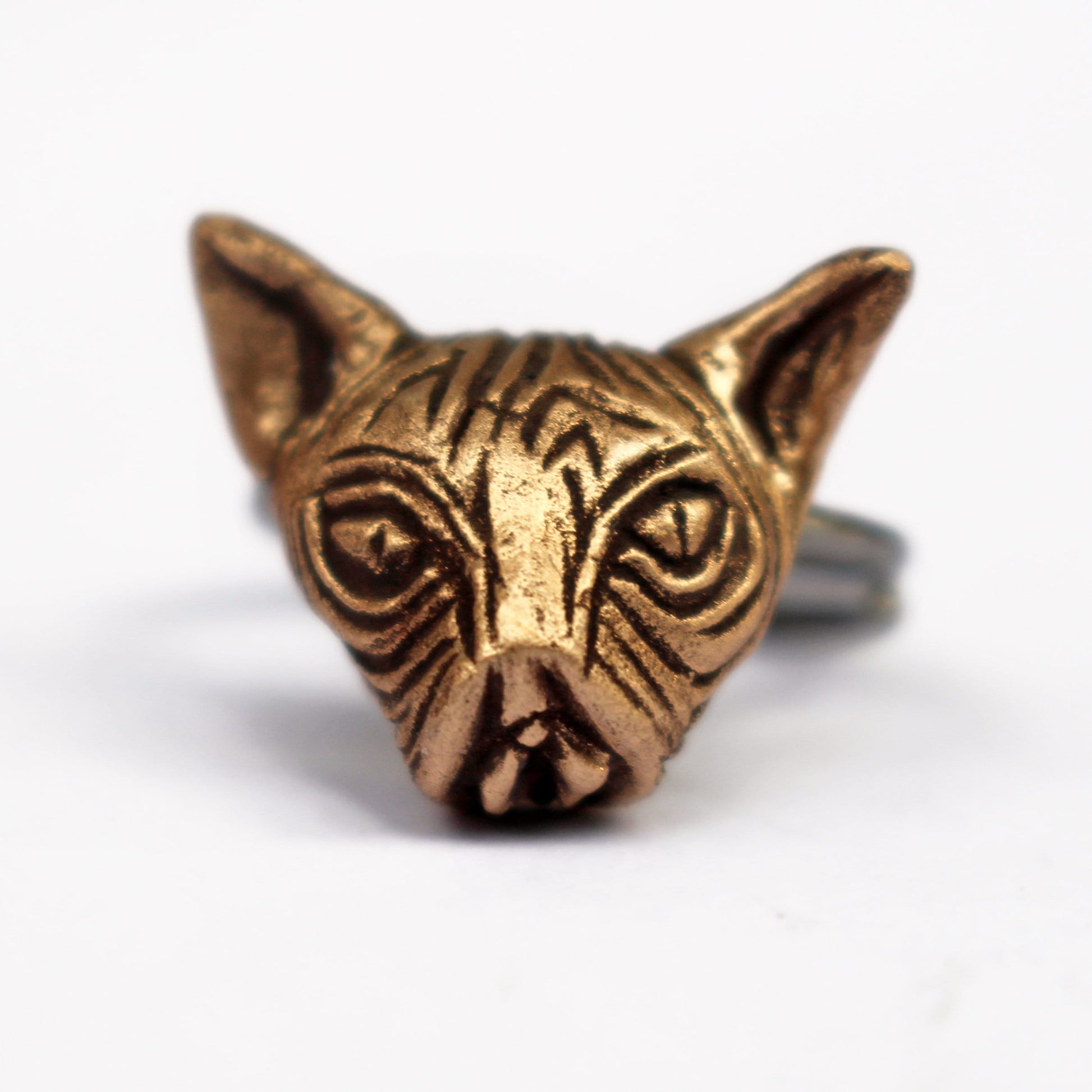 cat ring, hairless sphynx cat with a pussy for mouth. The ring is crafted from bronze and steel