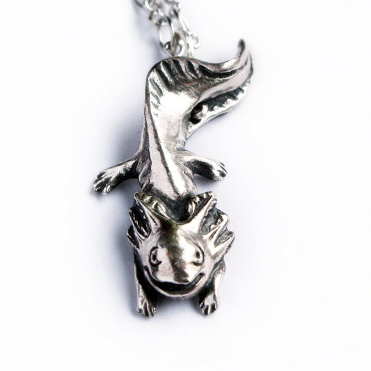 sterling silver axolotl necklace on a white background