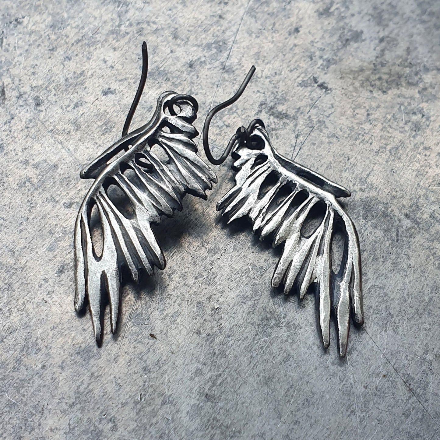 Sterling silver skeleton bird wing earrings with titanium hooks
