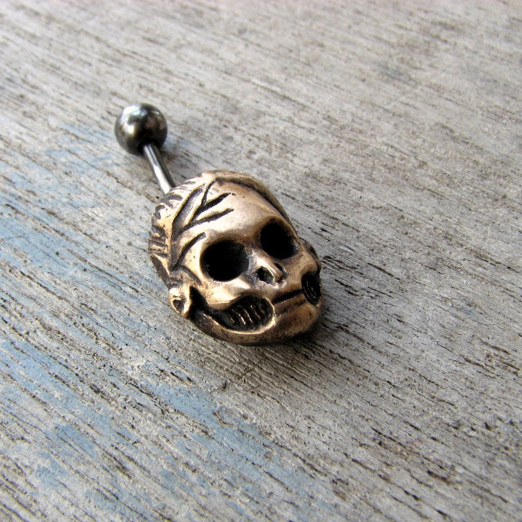 Döskalle navel piercing ring i brons och titan