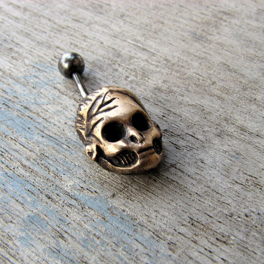Döskalle navel piercing ring i brons och titan