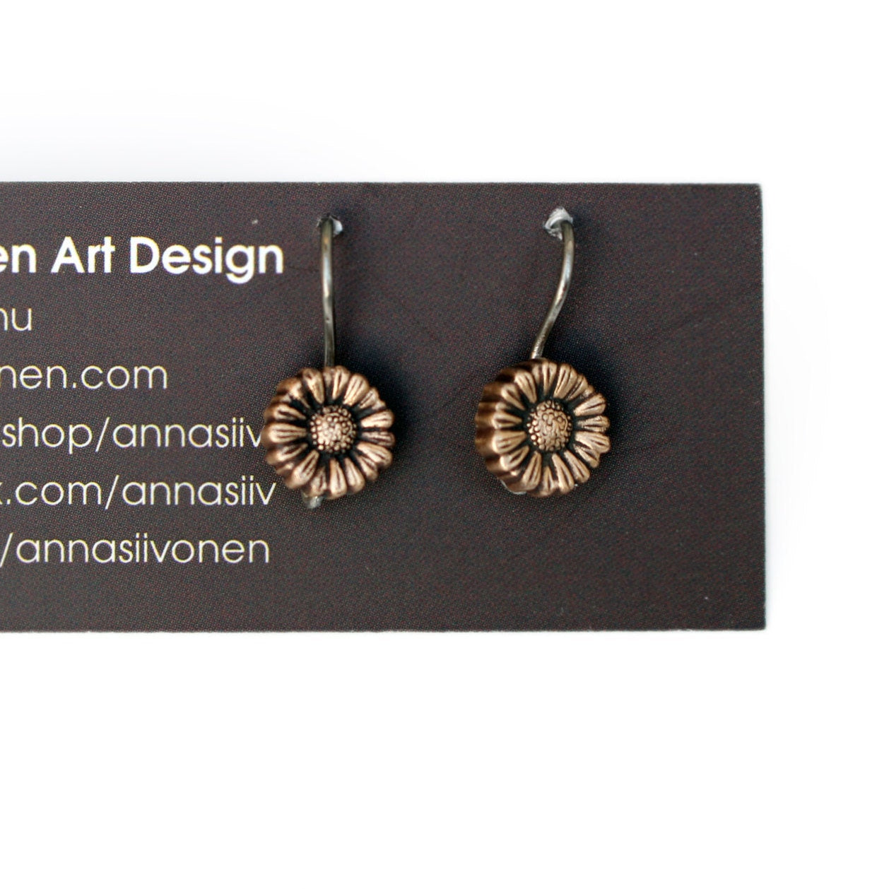 hängande solfjäderörhängen