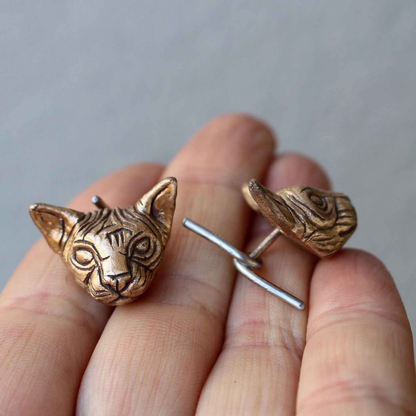 sphynx cat head cuff links in bronze and stainless steel