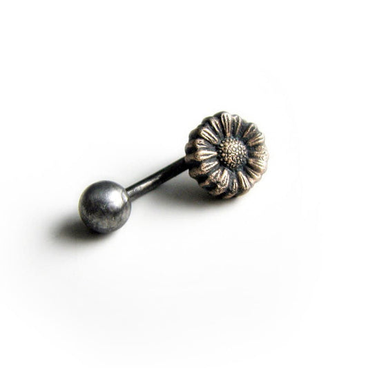 belly button ring with a bronze sunflower design attached to a curved titanium barbell