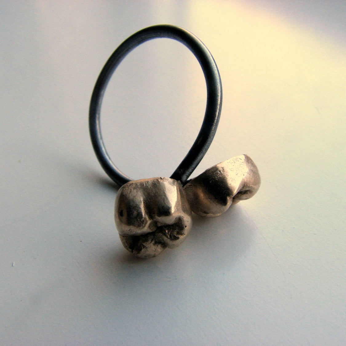 justerbar tand ring i brons och stål