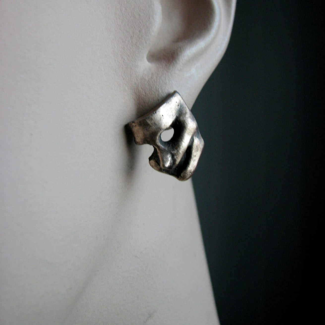 theatremask stud earring in bronze