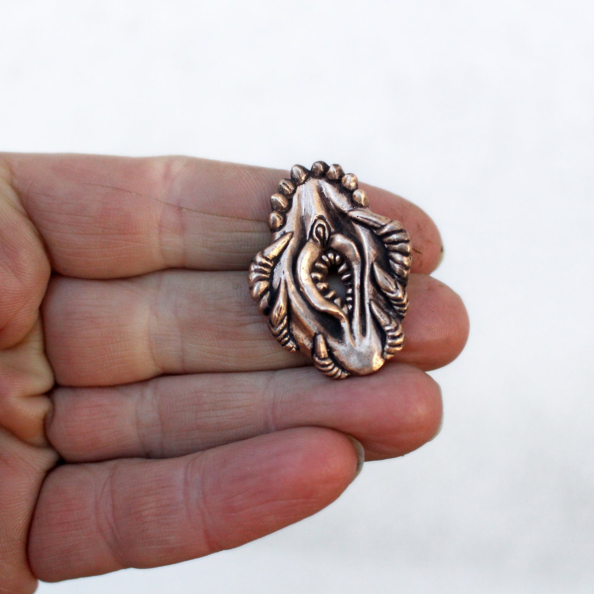 vagina dentata brooche, a pussy with fangs