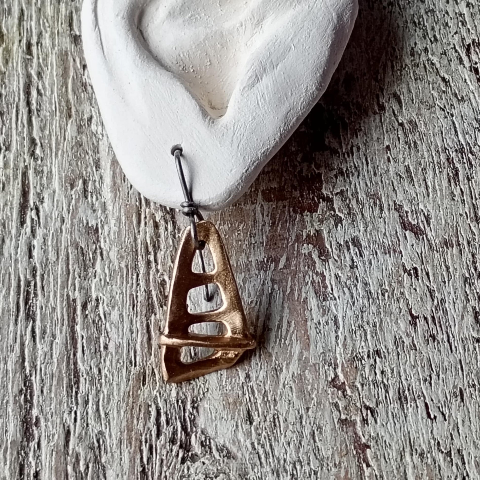 Bronze sailboat earring with allergy safe titanium hooks